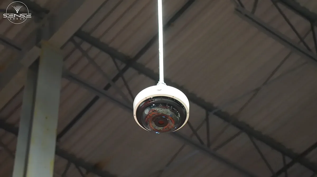 Fisheye camera hanging from the warehouse ceiling